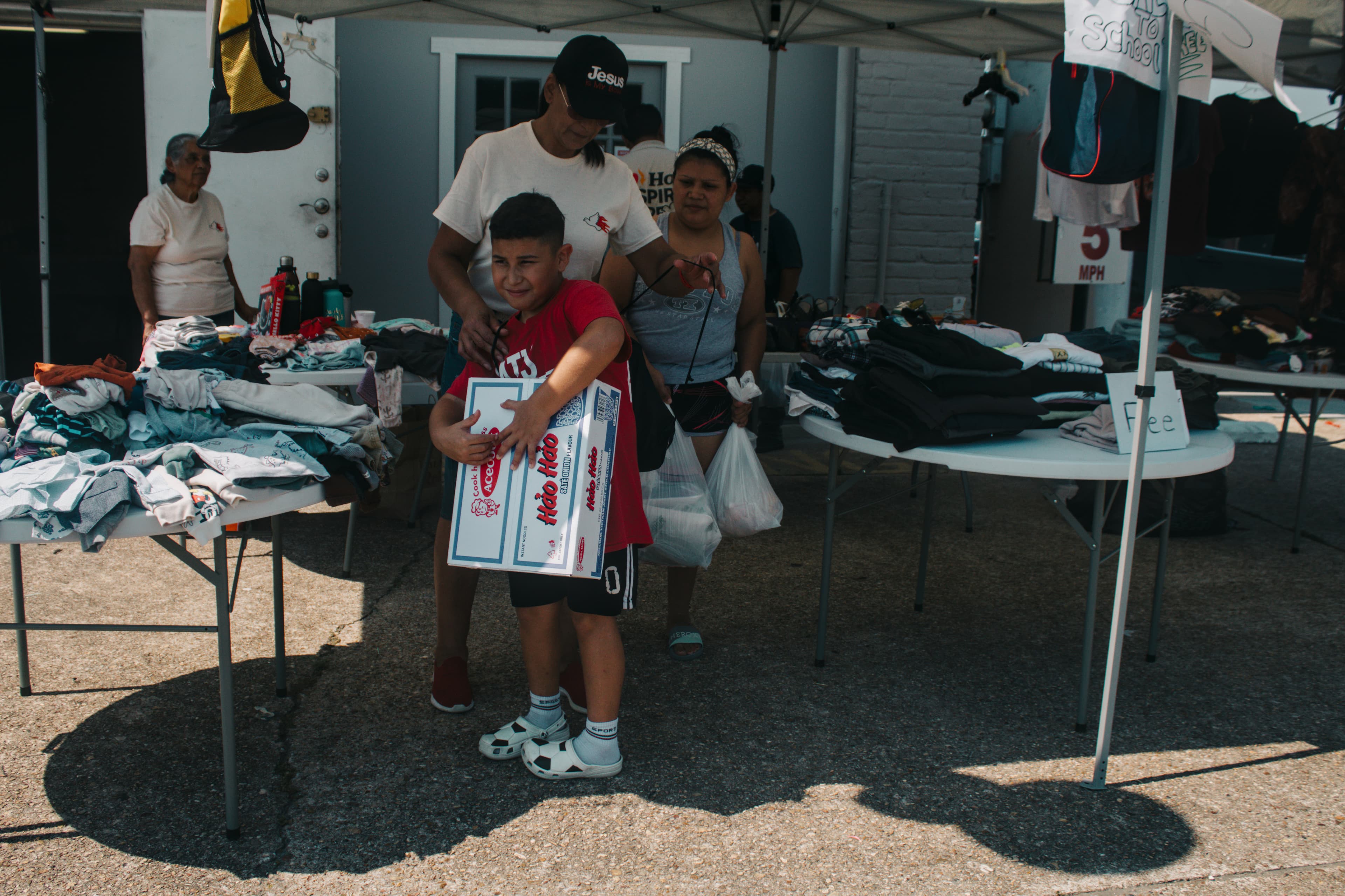 Picture showing people giving to the church and serving the community